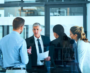 Corporate Finance image of team meeting